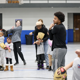 NWU softball and baseball players lead clinic with The Malone Center.